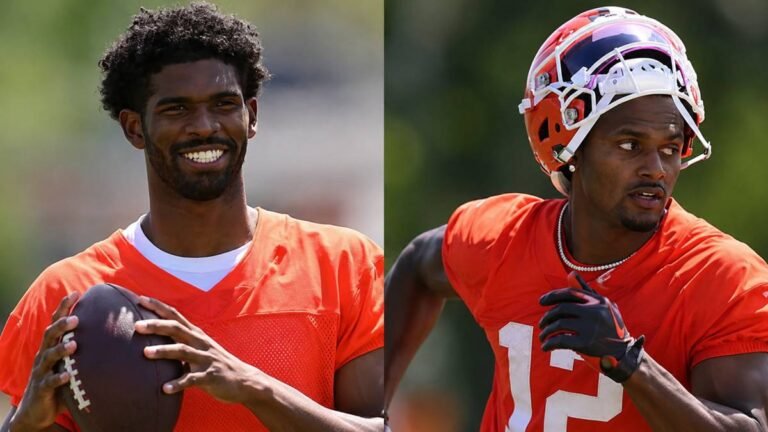 Split-view professional illustration of Deshaun Watson and Shedeur Sanders in Cleveland Browns uniforms during the 2026 quarterback competition, dramatic NFL-style sports graphic with intense atmosphere.