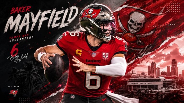 Baker Mayfield in Buccaneers red jersey throwing a football during OTA practice while head coach Todd Bowles observes from the sideline on a sunny Florida field.
