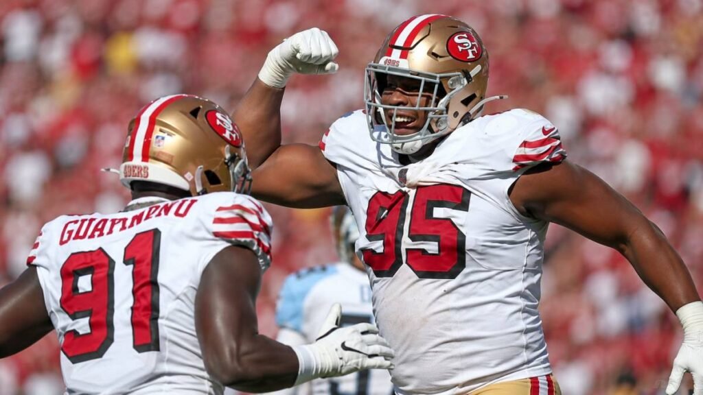 San Francisco 49ers defensive tackle Alfred Collins (No. 95) in action, shedding blocks and creating pressure during a 2025 NFL game.