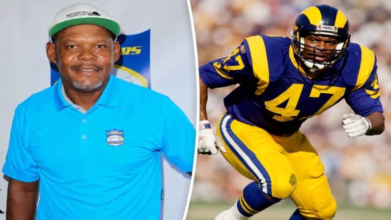 LeRoy Irvin #47 in full Los Angeles Rams uniform during his prime in the 1980s, intense focus on his face as he prepares for action.