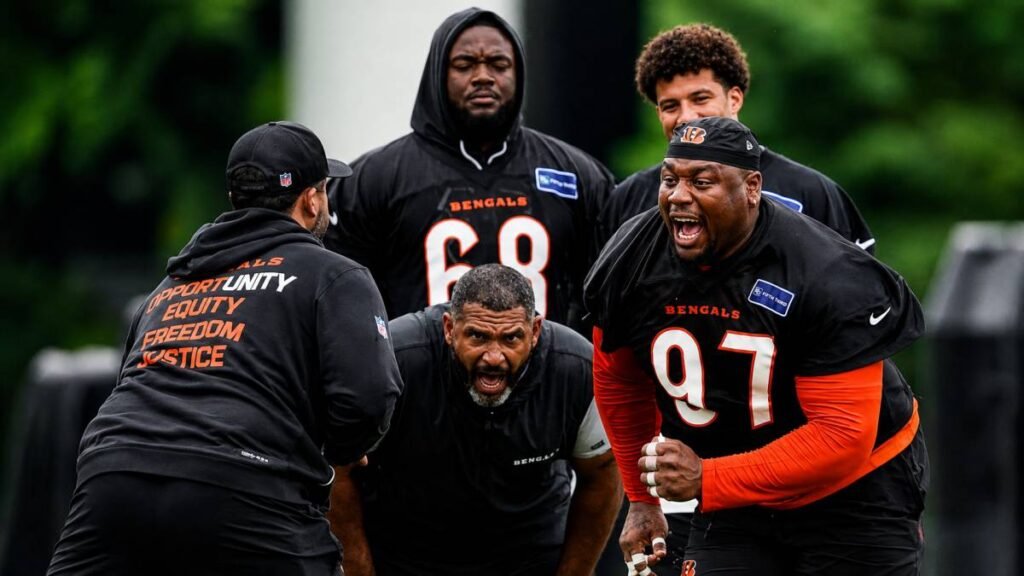 Cincinnati Bengals defensive tackle Dexter Lawrence (No. 97) powers through blockers during 2026 training camp at Kettering Health Practice Fields.